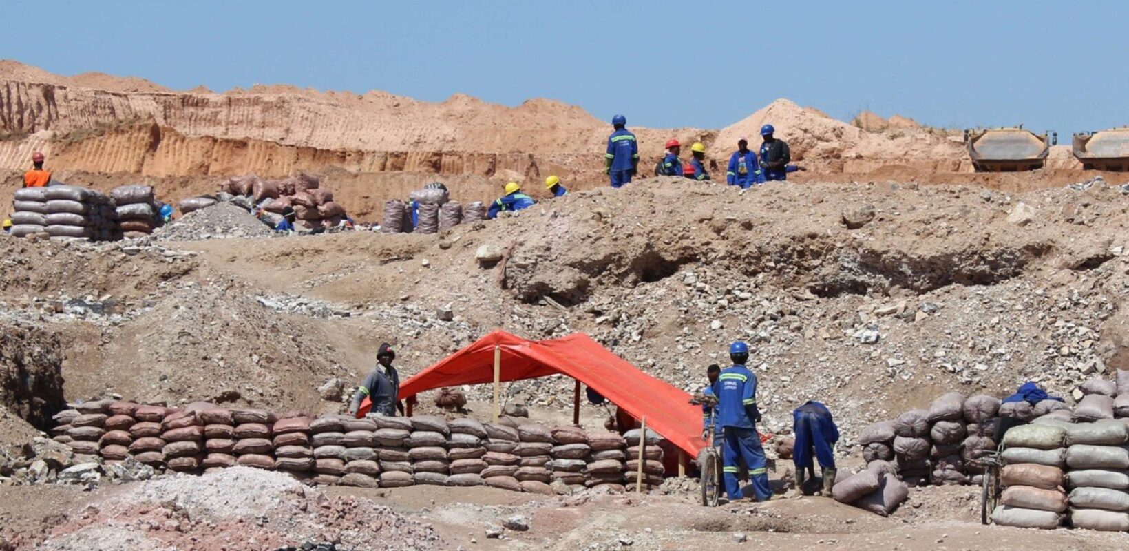 Mining site with multiple workers