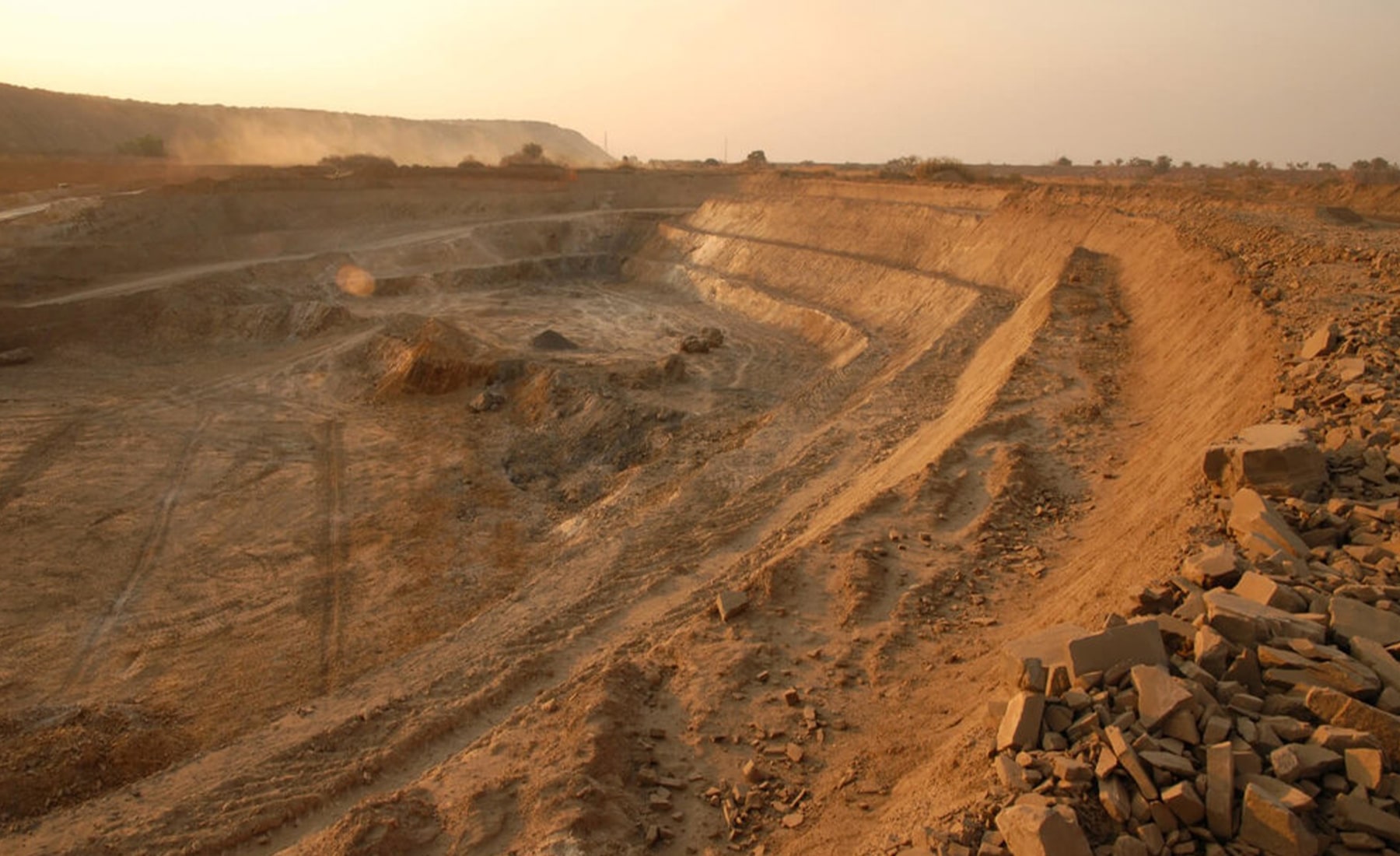 Mining quarry with a dusk sky